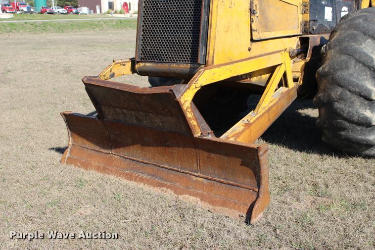 image for item L3028 1985 John Deere 648D skidder