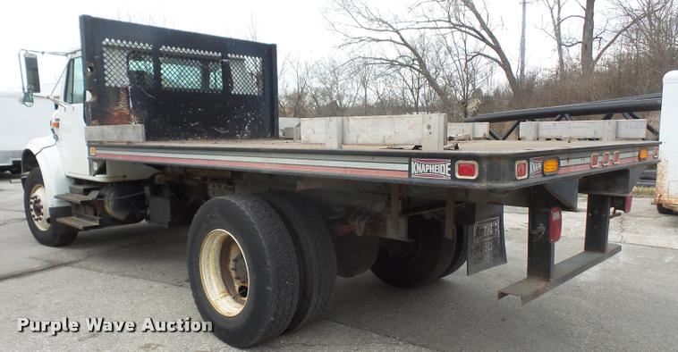 image for item DB0526 1999 International 4700 dump flatbed truck