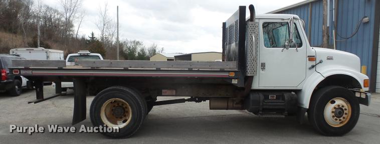 image for item DB0526 1999 International 4700 dump flatbed truck