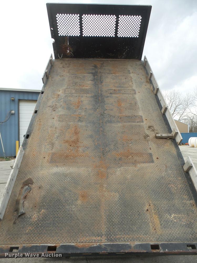 image for item DB0526 1999 International 4700 dump flatbed truck