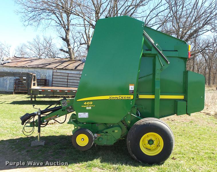 image for item DA2571 2013 John Deere 469 Mega Wide Plus round baler