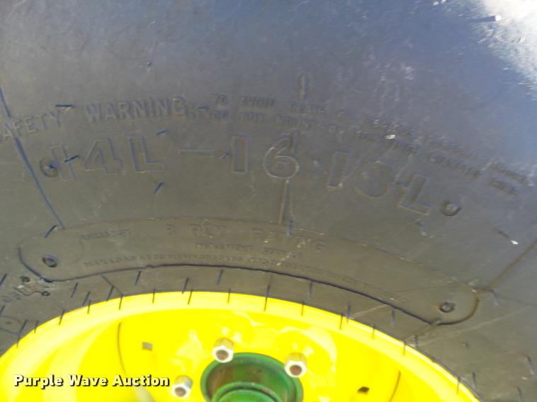 image for item DA2571 2013 John Deere 469 Mega Wide Plus round baler