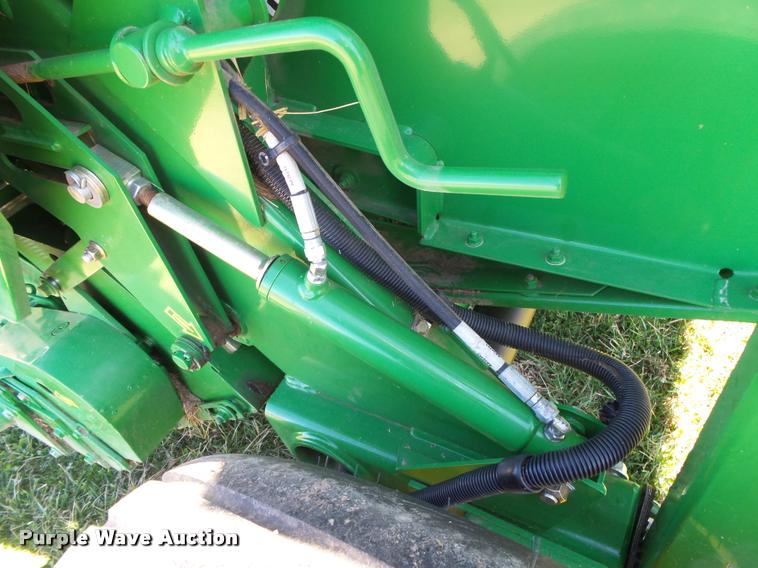 image for item DA2571 2013 John Deere 469 Mega Wide Plus round baler