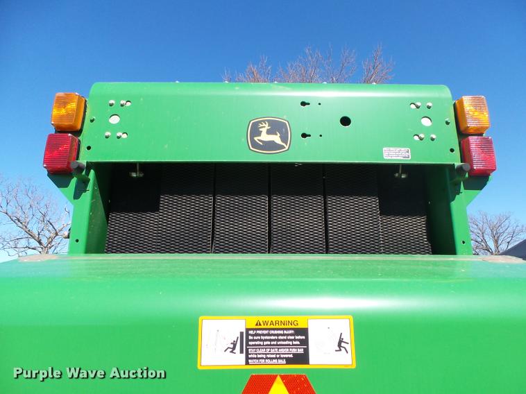 image for item DA2571 2013 John Deere 469 Mega Wide Plus round baler
