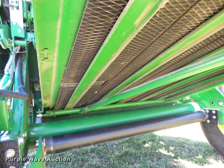 image for item DA2571 2013 John Deere 469 Mega Wide Plus round baler