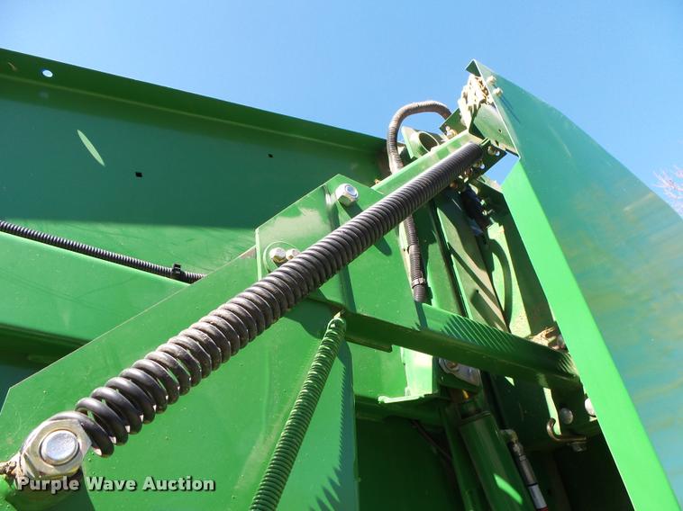 image for item DA2571 2013 John Deere 469 Mega Wide Plus round baler
