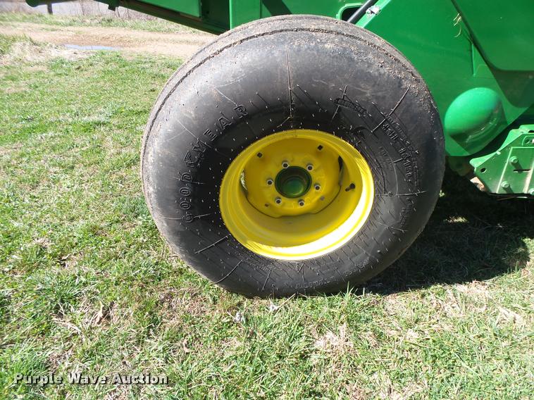 image for item DA2571 2013 John Deere 469 Mega Wide Plus round baler