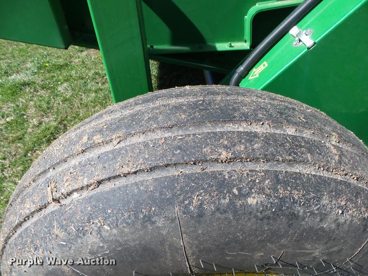 image for item DA2571 2013 John Deere 469 Mega Wide Plus round baler