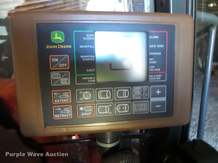 image for item DA2571 2013 John Deere 469 Mega Wide Plus round baler