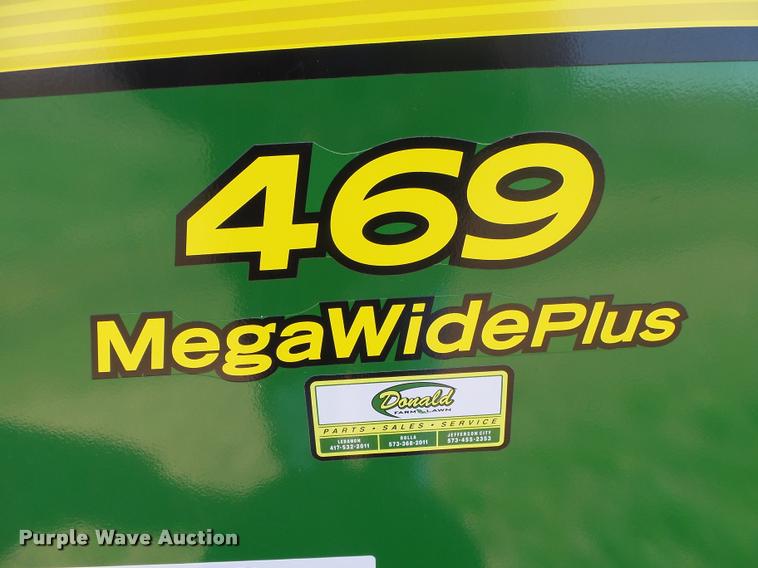 image for item DA2571 2013 John Deere 469 Mega Wide Plus round baler