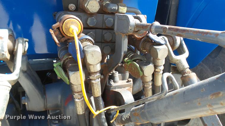 image for item DS9192 New Holland TN75 tractor with loader