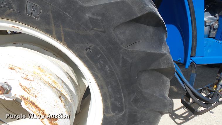 image for item DS9192 New Holland TN75 tractor with loader