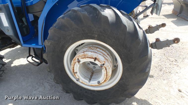 image for item DS9192 New Holland TN75 tractor with loader