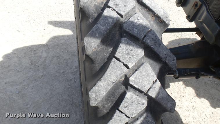 image for item DS9192 New Holland TN75 tractor with loader