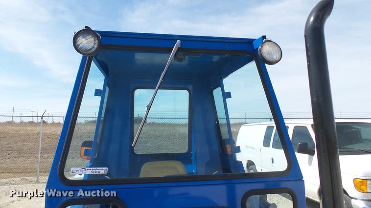 image for item DS9192 New Holland TN75 tractor with loader