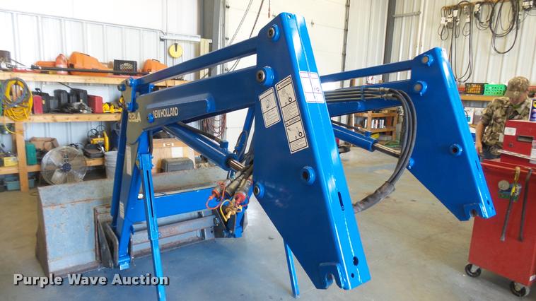 image for item DS9192 New Holland TN75 tractor with loader