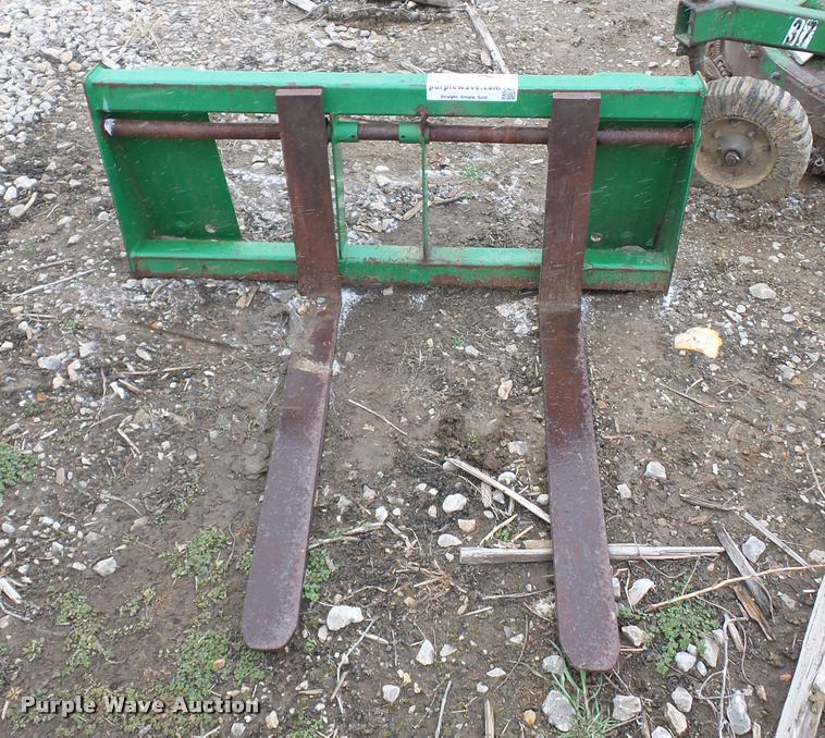 image for item J1556 John Deere pallet forks