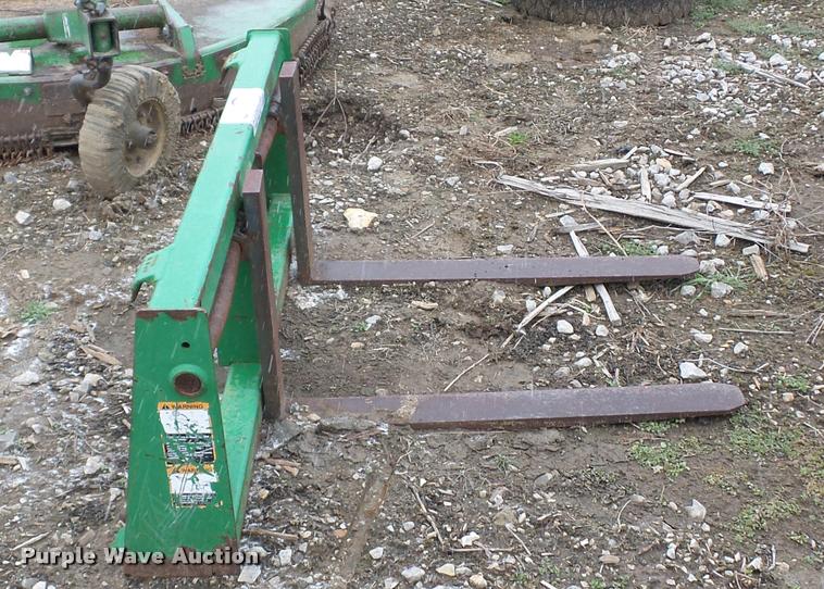 image for item J1556 John Deere pallet forks