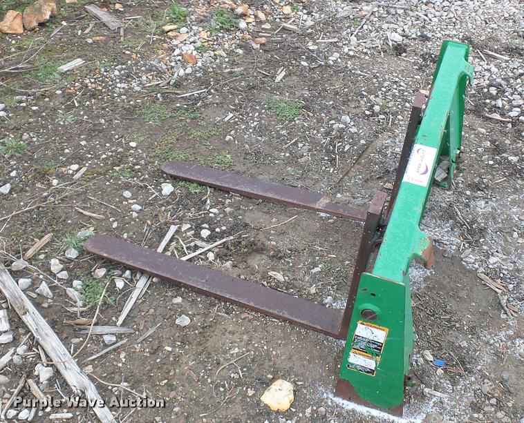 image for item J1556 John Deere pallet forks