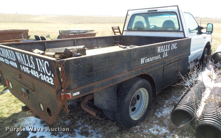 image for item CB9879 1999 Ford F450 Super Duty flatbed truck