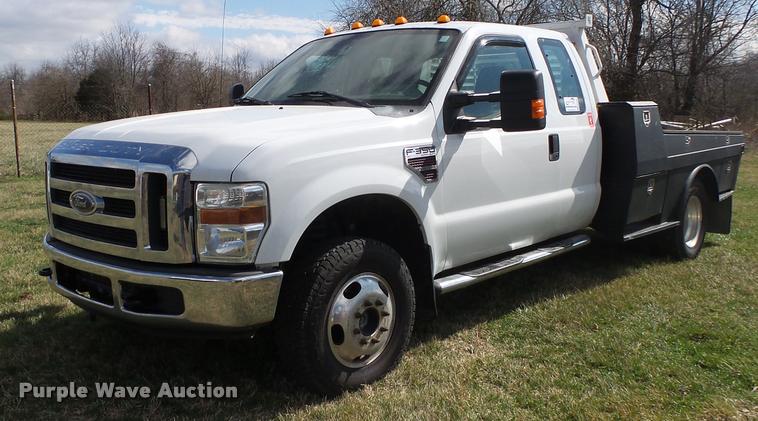 image for item DA2568 2008 Ford F350 Super Duty SuperCab flatbed pickup truck