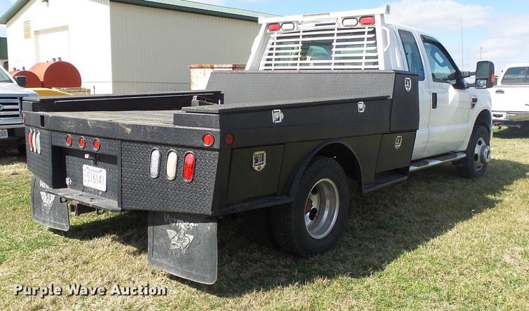 image for item DA2568 2008 Ford F350 Super Duty SuperCab flatbed pickup truck