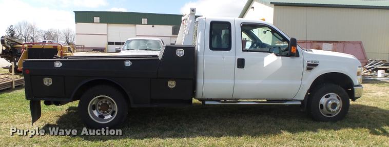 image for item DA2568 2008 Ford F350 Super Duty SuperCab flatbed pickup truck