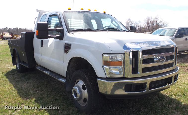 image for item DA2568 2008 Ford F350 Super Duty SuperCab flatbed pickup truck