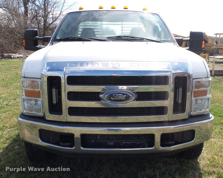 image for item DA2568 2008 Ford F350 Super Duty SuperCab flatbed pickup truck