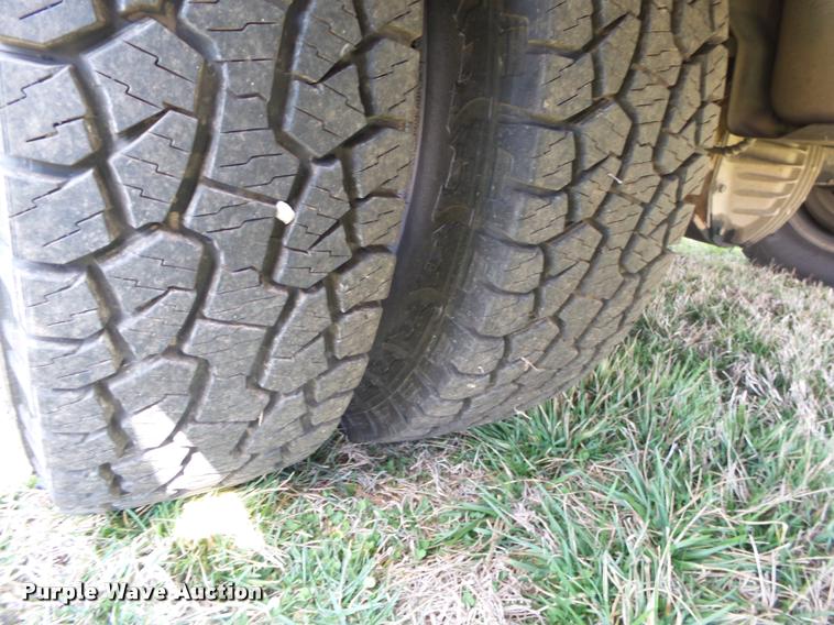 image for item DA2568 2008 Ford F350 Super Duty SuperCab flatbed pickup truck