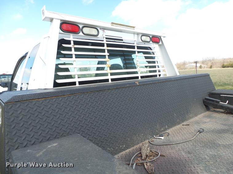 image for item DA2568 2008 Ford F350 Super Duty SuperCab flatbed pickup truck