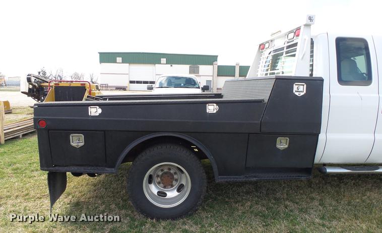image for item DA2568 2008 Ford F350 Super Duty SuperCab flatbed pickup truck