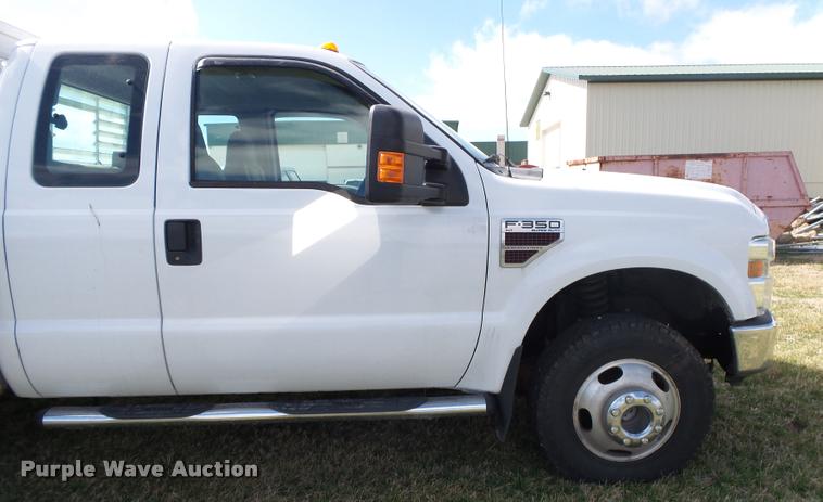 image for item DA2568 2008 Ford F350 Super Duty SuperCab flatbed pickup truck