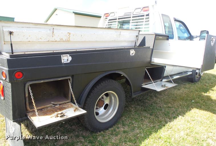 image for item DA2568 2008 Ford F350 Super Duty SuperCab flatbed pickup truck