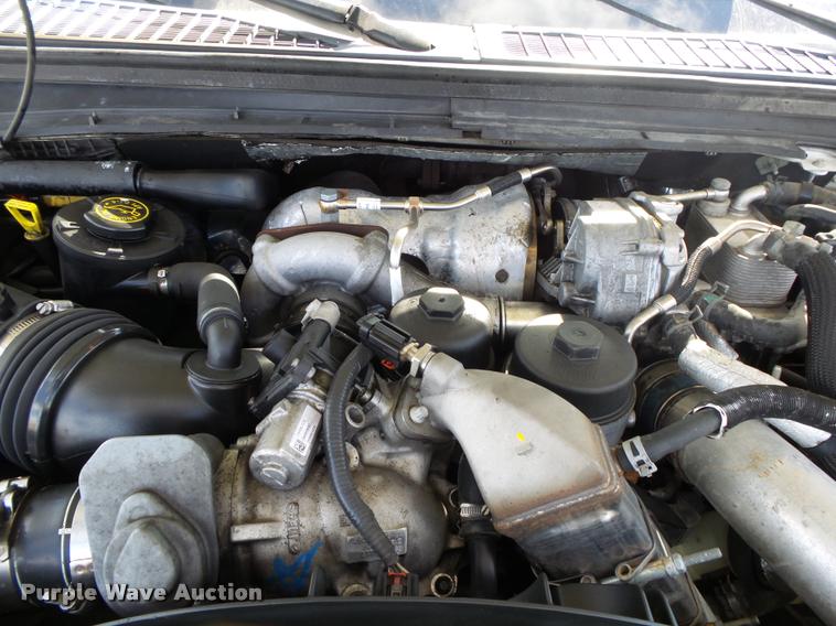 image for item DA2568 2008 Ford F350 Super Duty SuperCab flatbed pickup truck