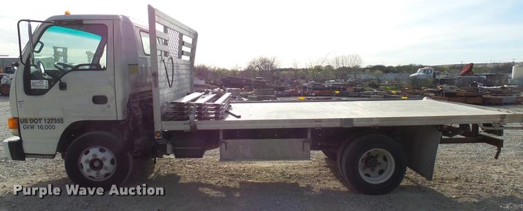 image for item DB2463 2004 Isuzu NPR flatbed truck