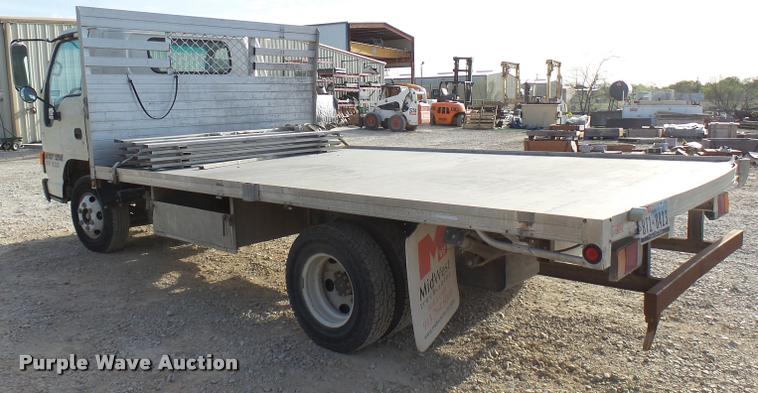 image for item DB2463 2004 Isuzu NPR flatbed truck