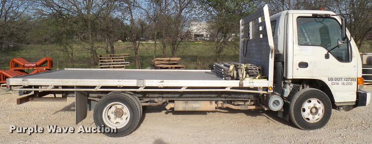 image for item DB2463 2004 Isuzu NPR flatbed truck