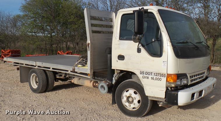 image for item DB2463 2004 Isuzu NPR flatbed truck