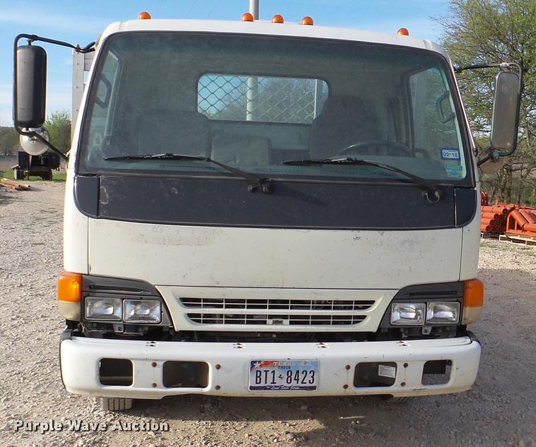 image for item DB2463 2004 Isuzu NPR flatbed truck