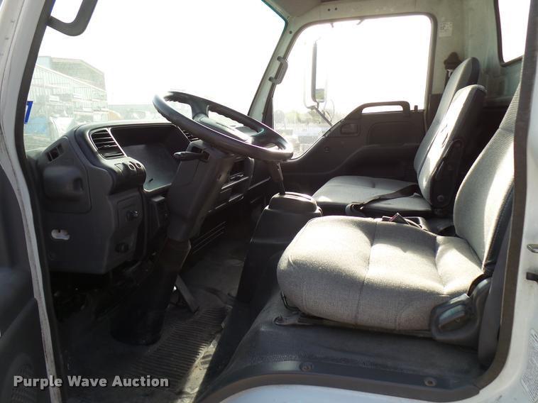 image for item DB2463 2004 Isuzu NPR flatbed truck