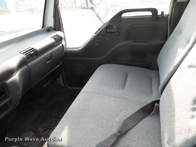 image for item DB2463 2004 Isuzu NPR flatbed truck