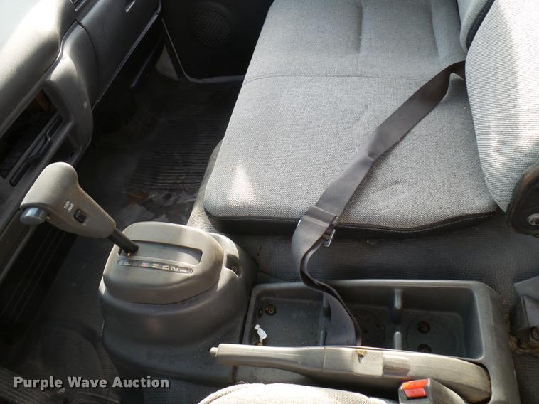 image for item DB2463 2004 Isuzu NPR flatbed truck