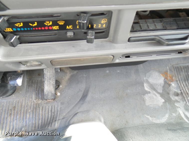 image for item DB2463 2004 Isuzu NPR flatbed truck