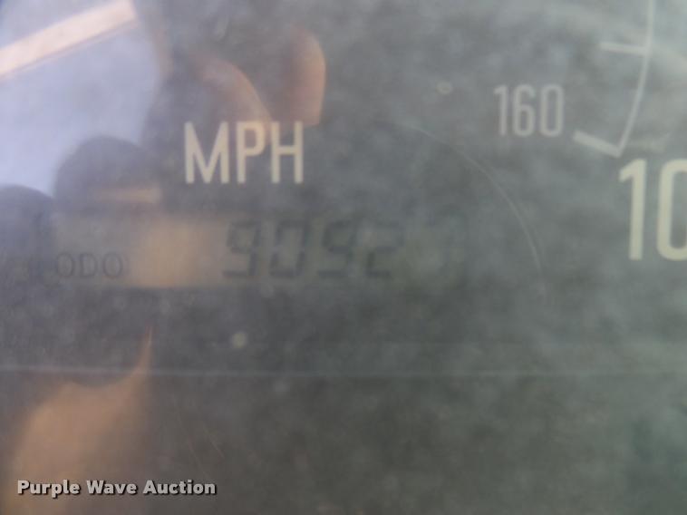 image for item DB2463 2004 Isuzu NPR flatbed truck