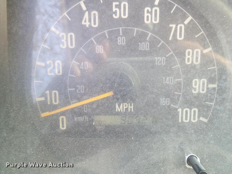 image for item DB2463 2004 Isuzu NPR flatbed truck