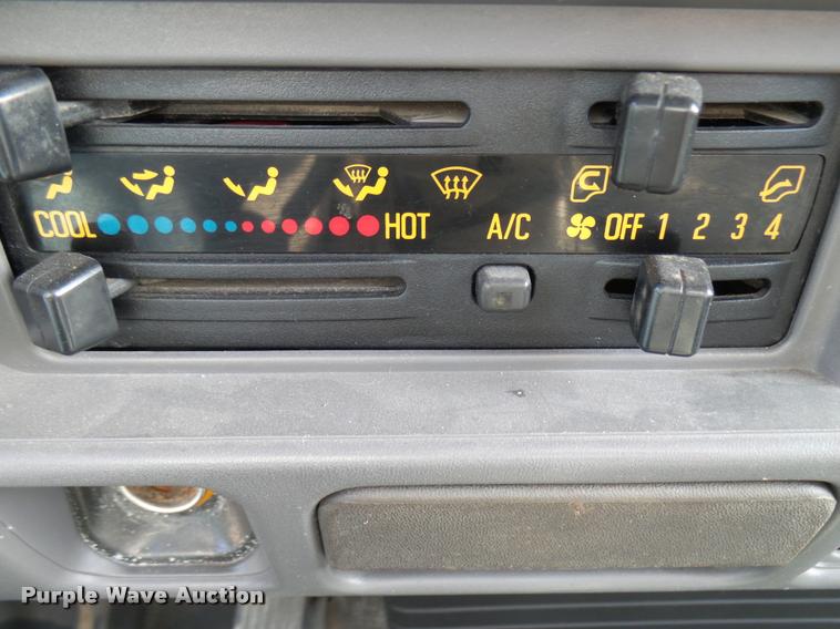 image for item DB2463 2004 Isuzu NPR flatbed truck