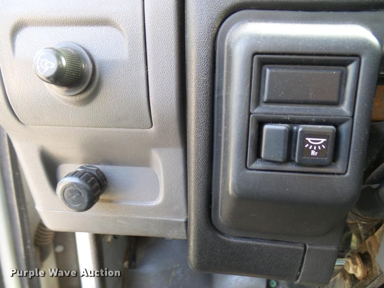 image for item DB2463 2004 Isuzu NPR flatbed truck