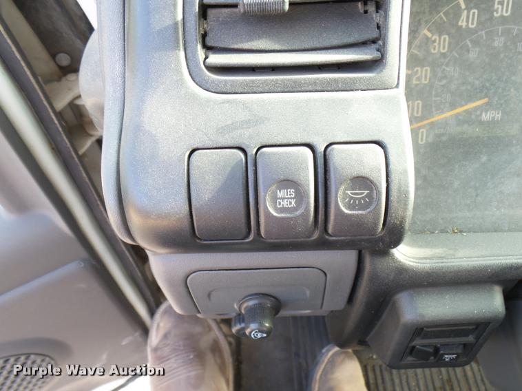 image for item DB2463 2004 Isuzu NPR flatbed truck