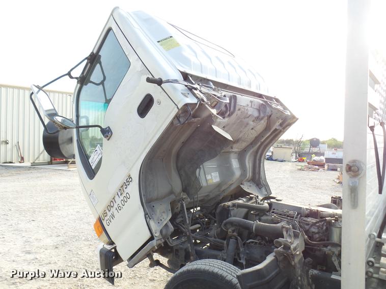 image for item DB2463 2004 Isuzu NPR flatbed truck